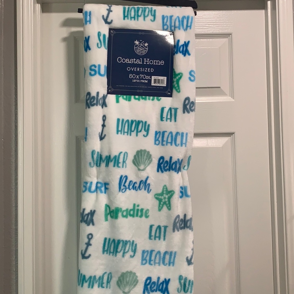 Oversized coastal home throw with tags
